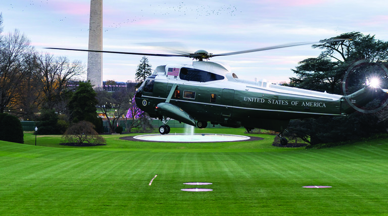 president's helicopter taking off from the white house lawn